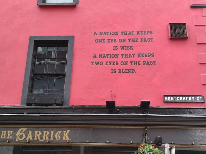 Text painted on the side of The Garrick: "A nation that keeps one eye on the past is wise, a nation that keeps two eyes on the past is blind."